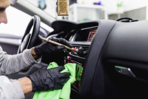 man cleaning car interior car detailing at CT Detailing, Louisville, KY
